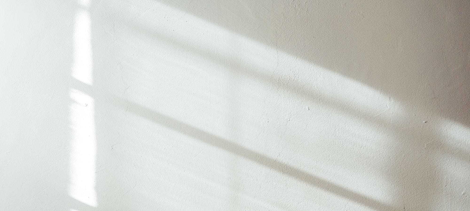 Superficie continua neutra, di tono diverso, usata come fondo della pagina
